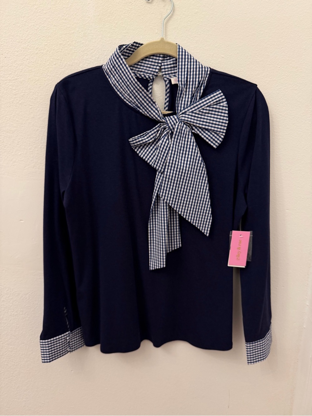 Riley & Rae Navy Top with Pink Brand Tag